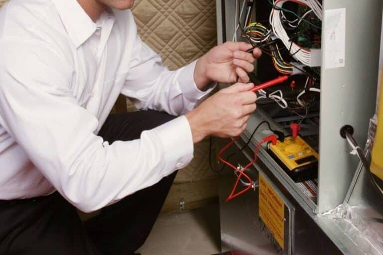 Technician working on a furnace