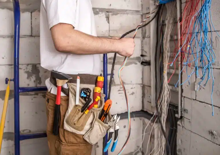 Electrician working with wires