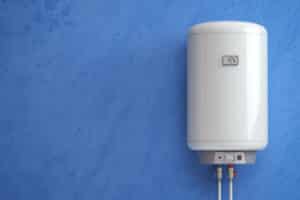 A tankless hot water heater on a blue wall