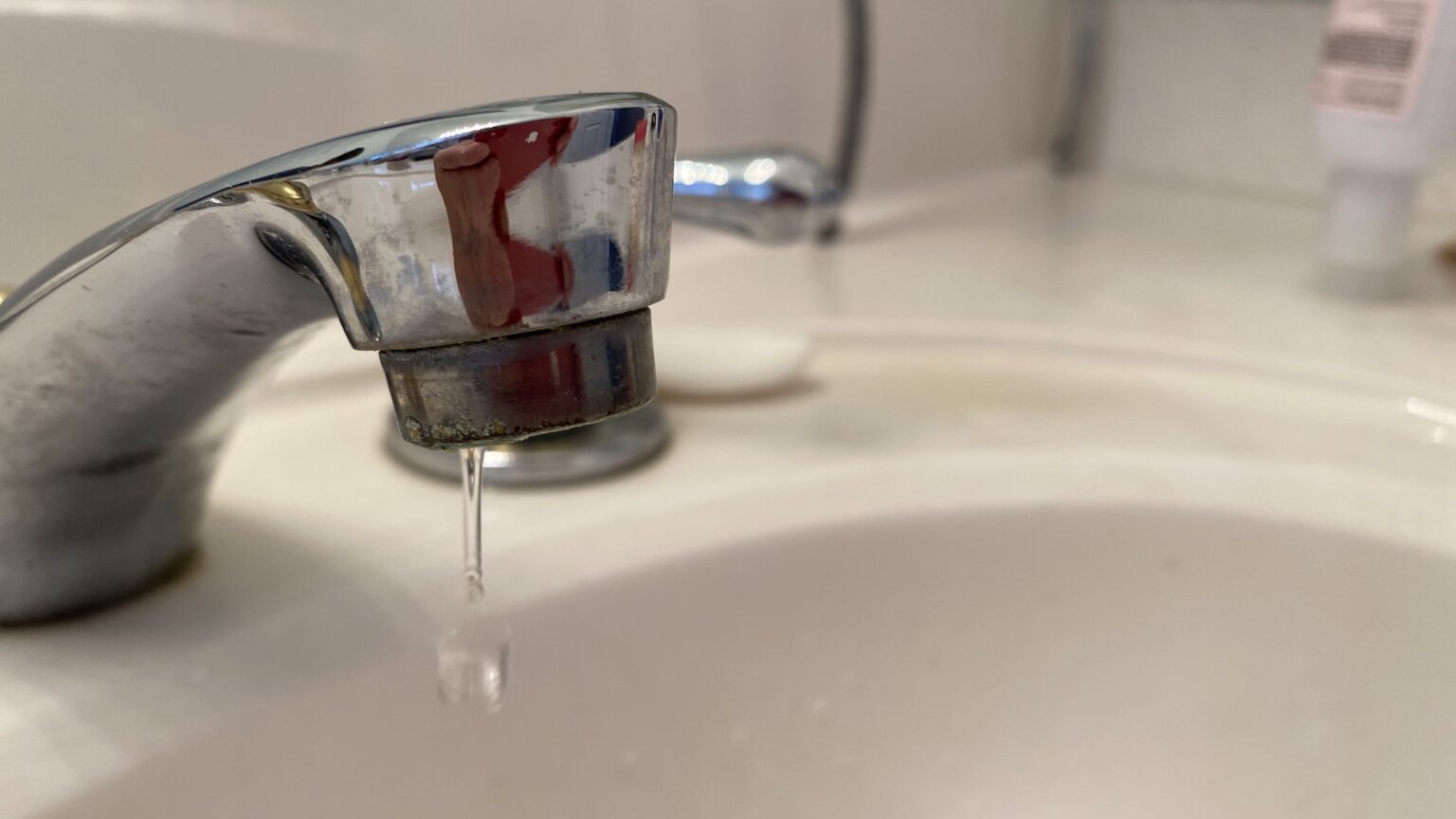 A faucet drips