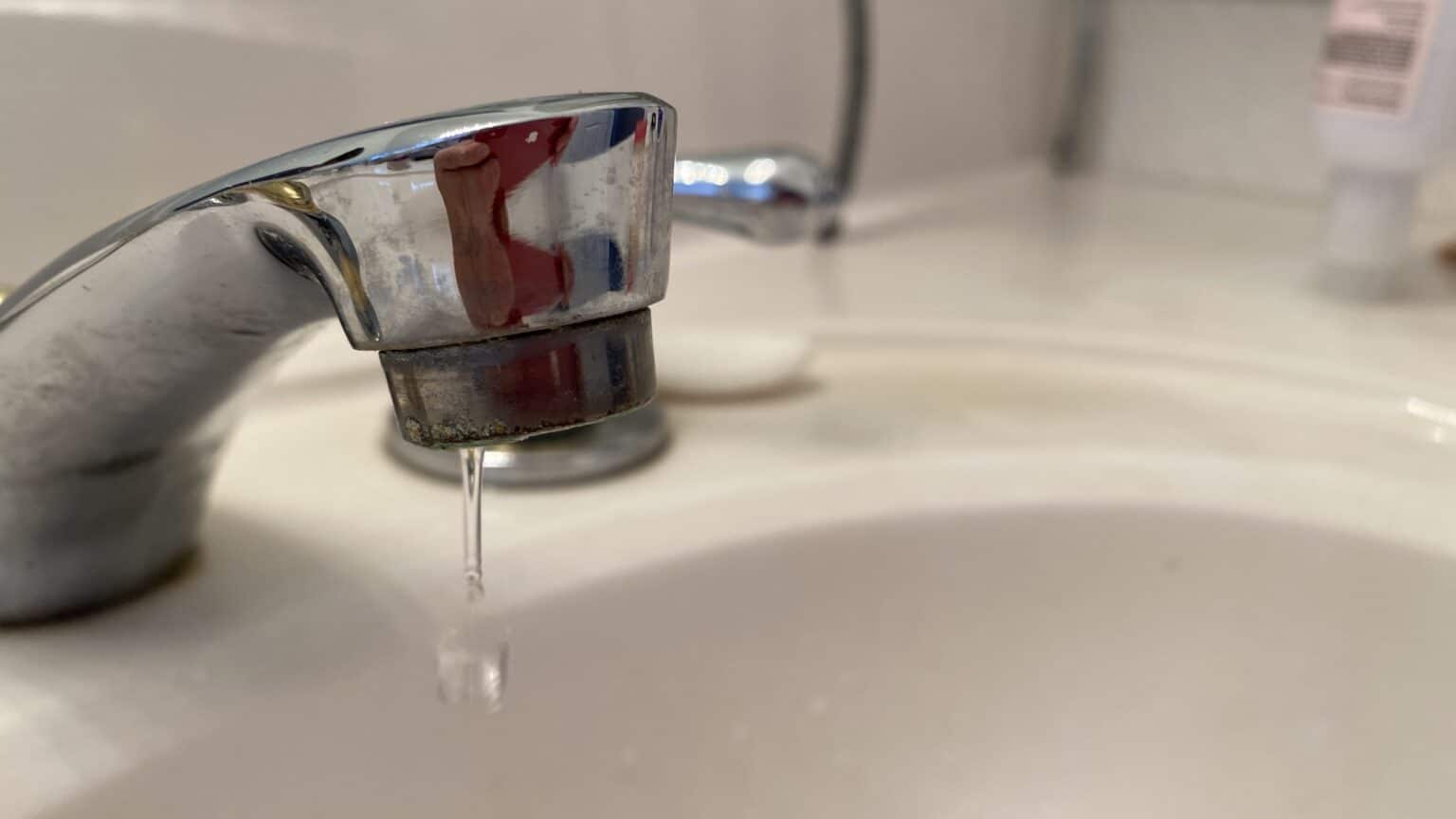 a faucet drips water
