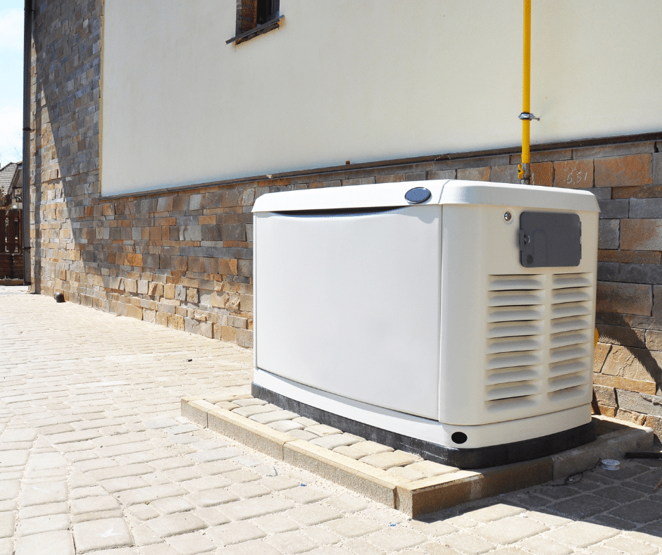 A standby generator sits outside a house