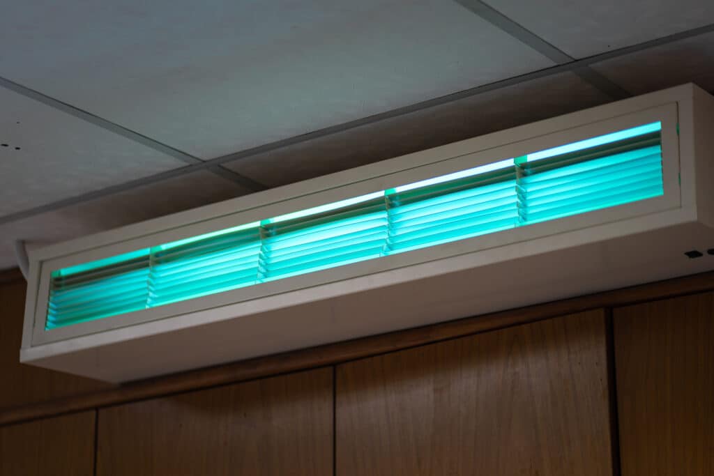 UV-C light technology in wall mounted indoor HVAC unit