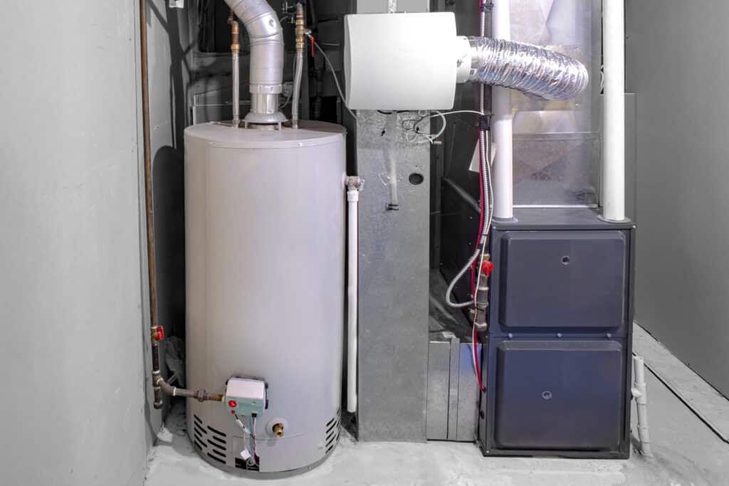 A residential basement with high efficiency furnace and gas water heater